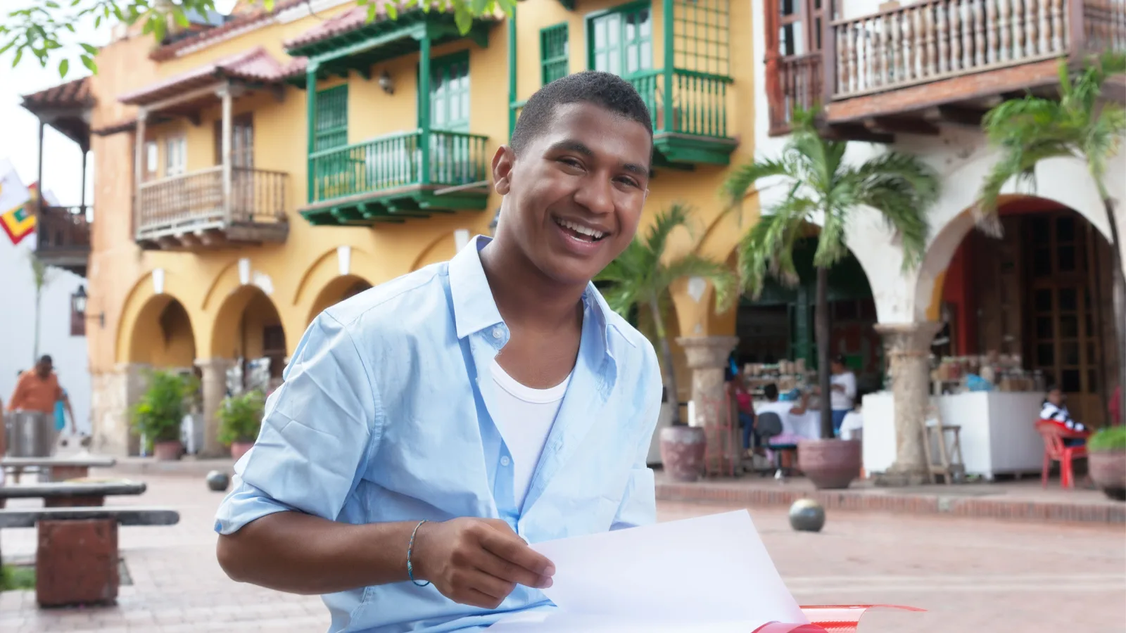 Black student reviews college papers in Panama