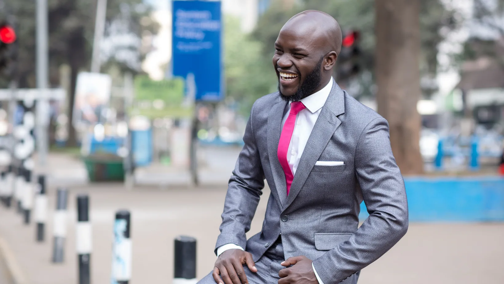 African man in a suit poses in Nairobi, Kenya