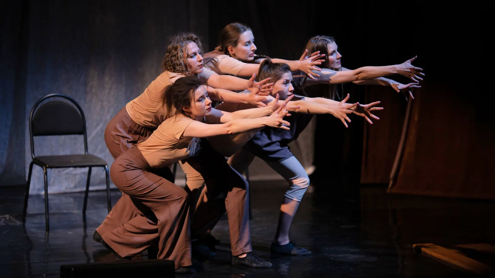 Actors and artists performing an interpretive dance