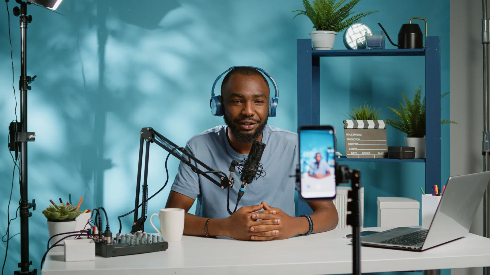 Young Black man records video content for streaming platforms